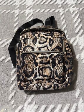 Snake-Print Mini Backpack – Black & Brown